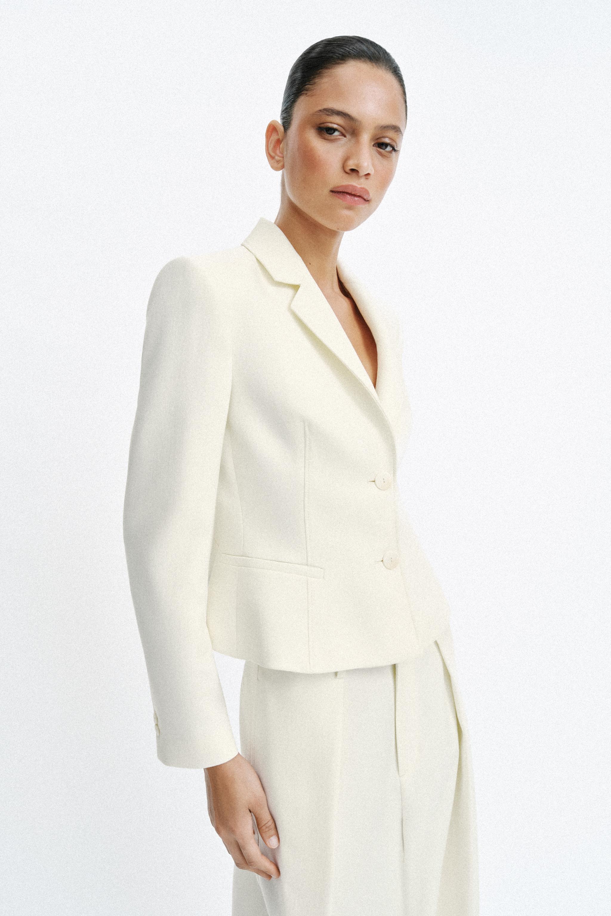 VESTE AJUSTÉE À ÉPAULETTES